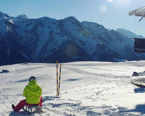 Tobogganing from Fiescheralp to Lax