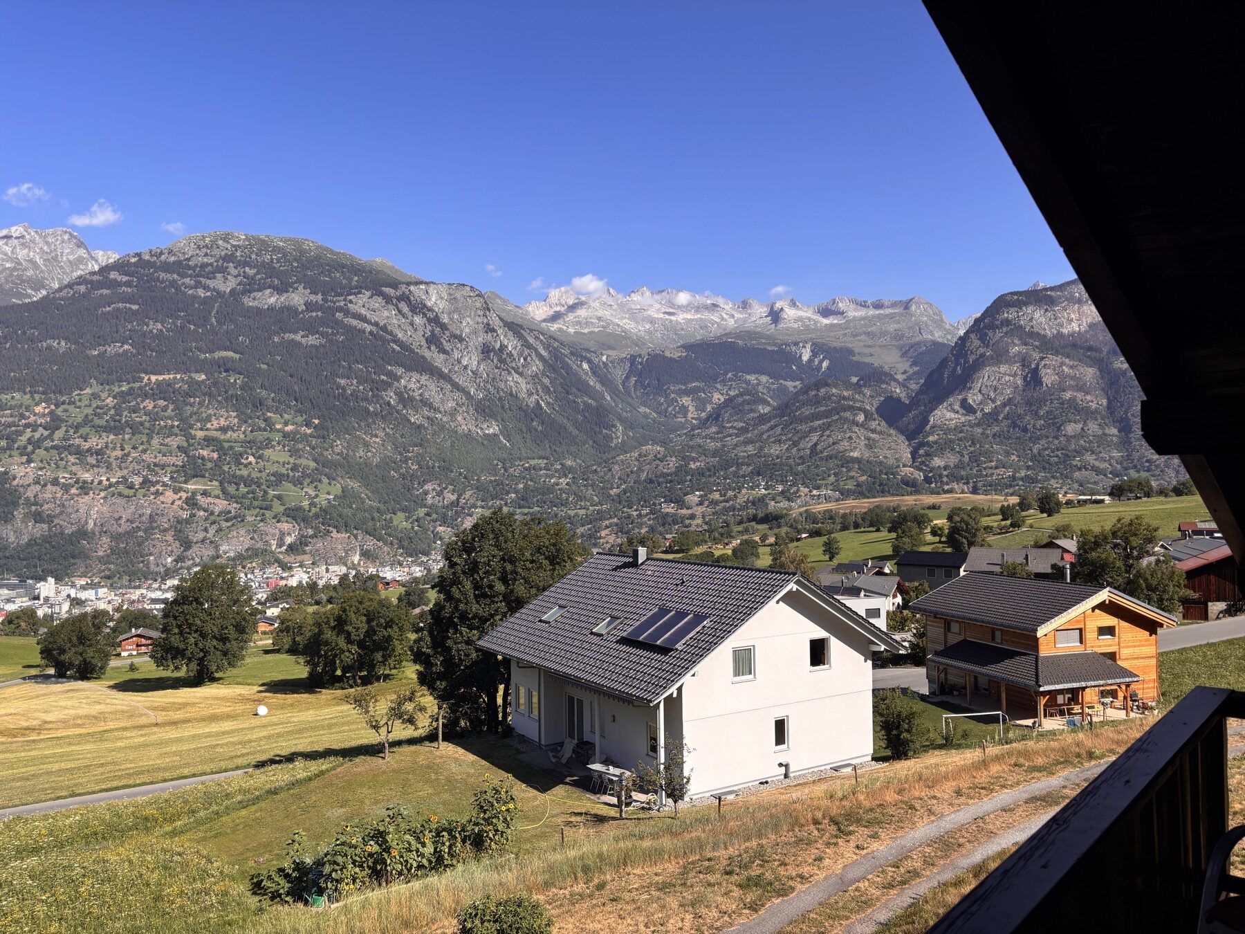 View from the Chalet Blue Spoon balcony over Brig and the mountains